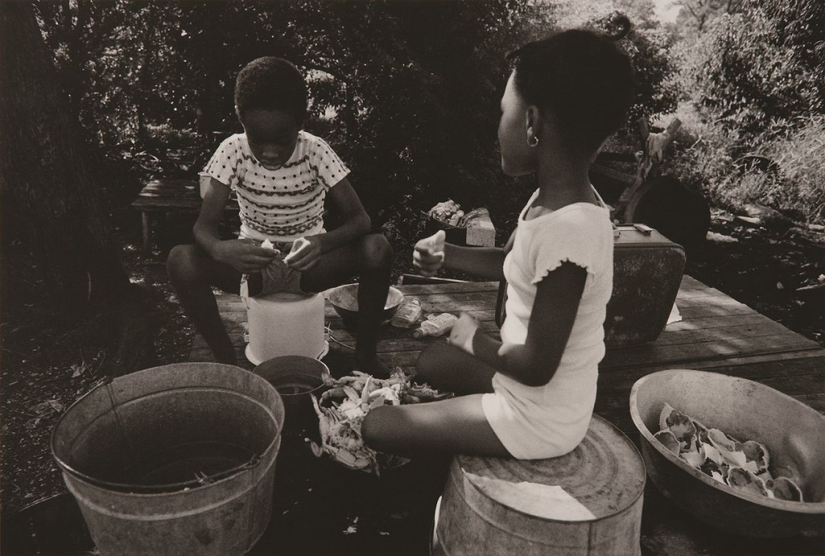 Children inspecting crab catch