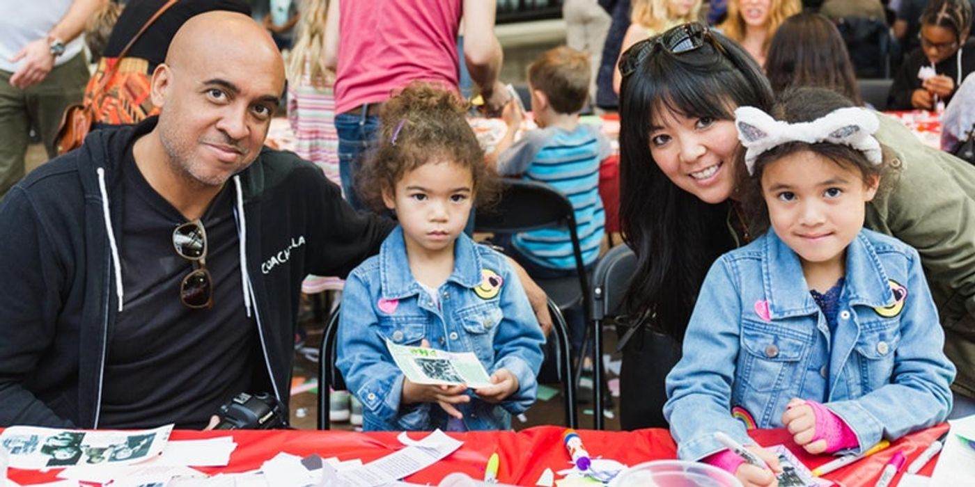 Families participating in an art workshop