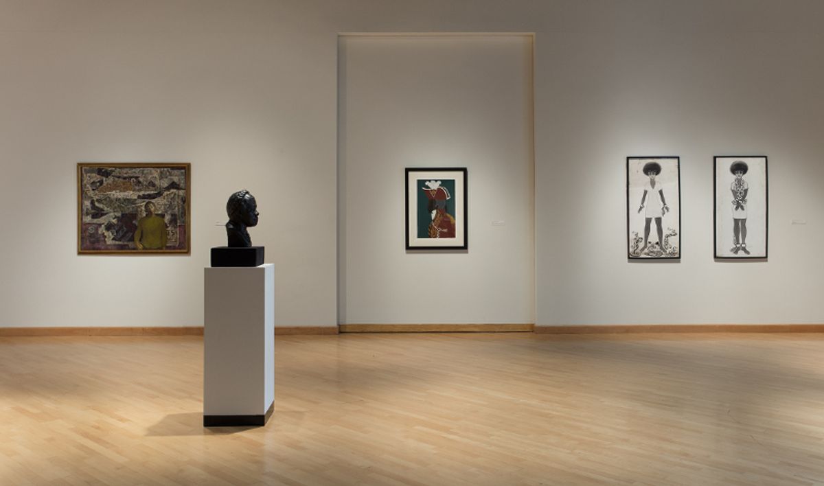 Installation view of quiet collection of portraits and sculpture