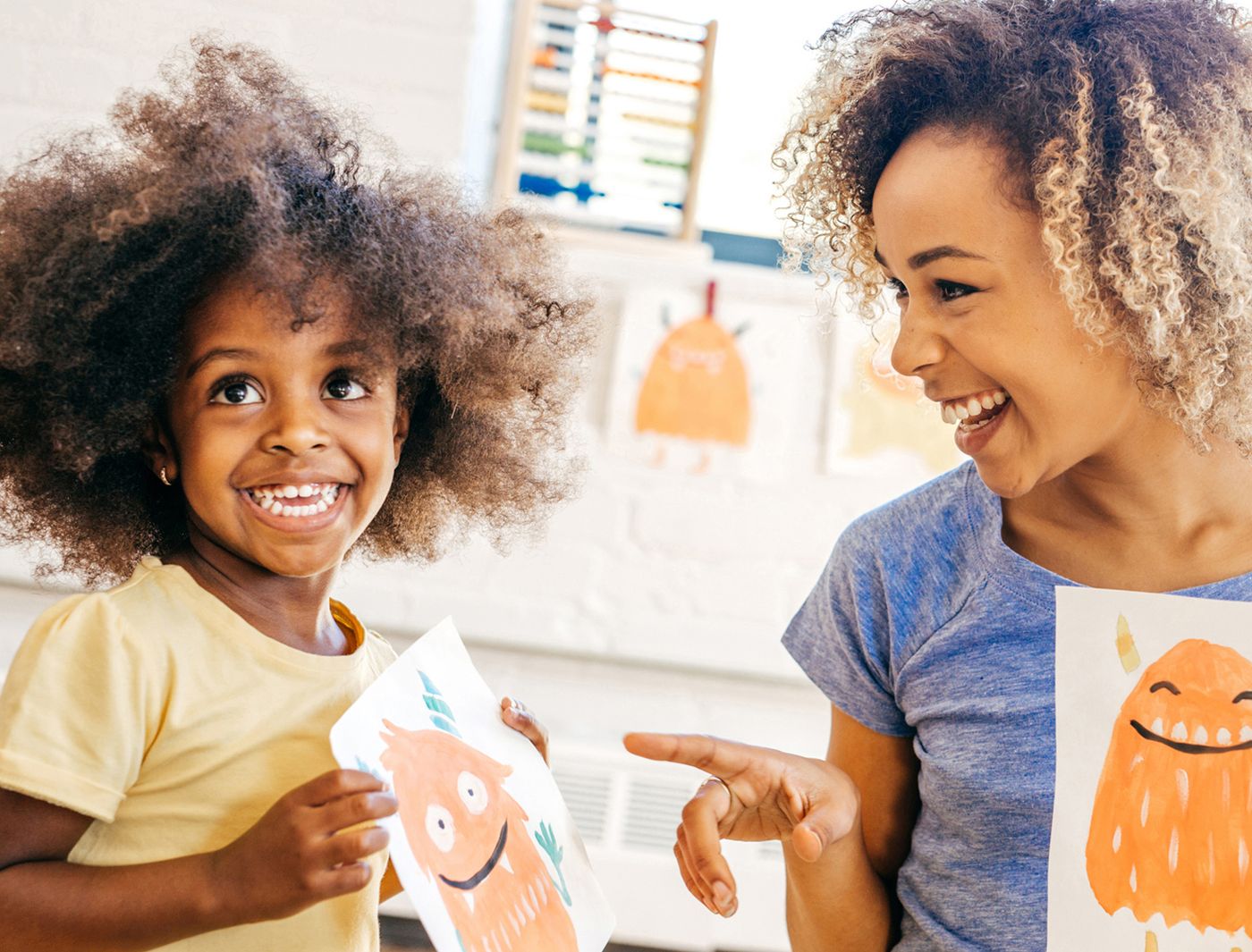 Family participating in an art workshop