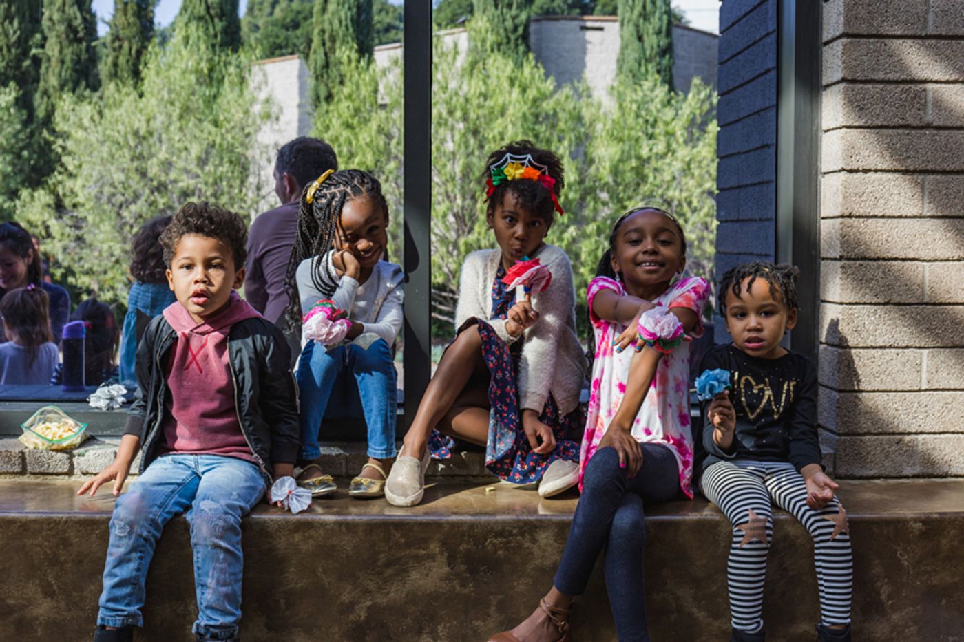 Children on the steps of the California African American Museum