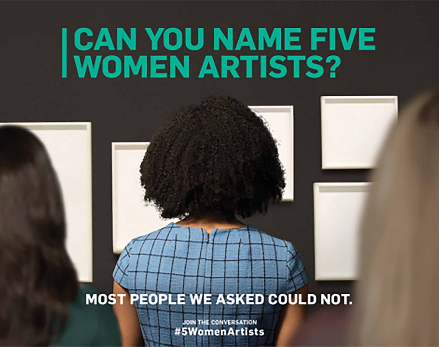 Gallery attendants looking at blank canvases