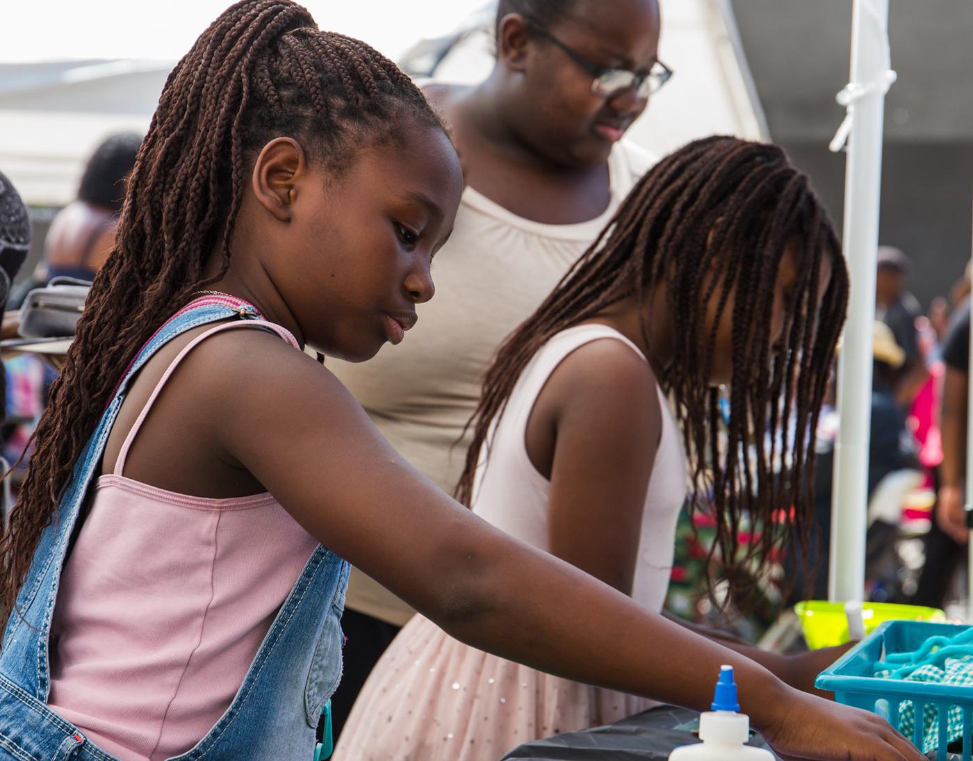 Families participating in an art workshop at the California African American Museum