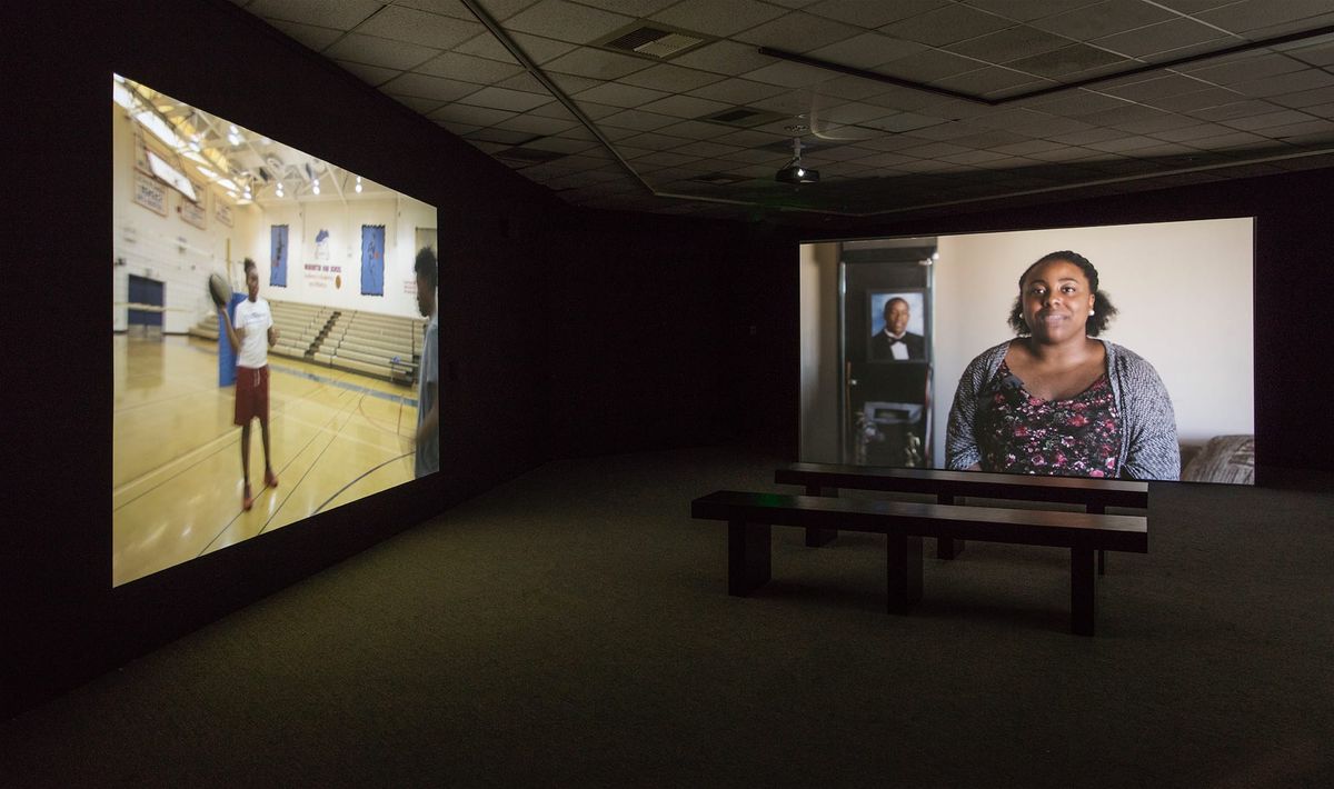 Installation view of two of the three large scale monitors