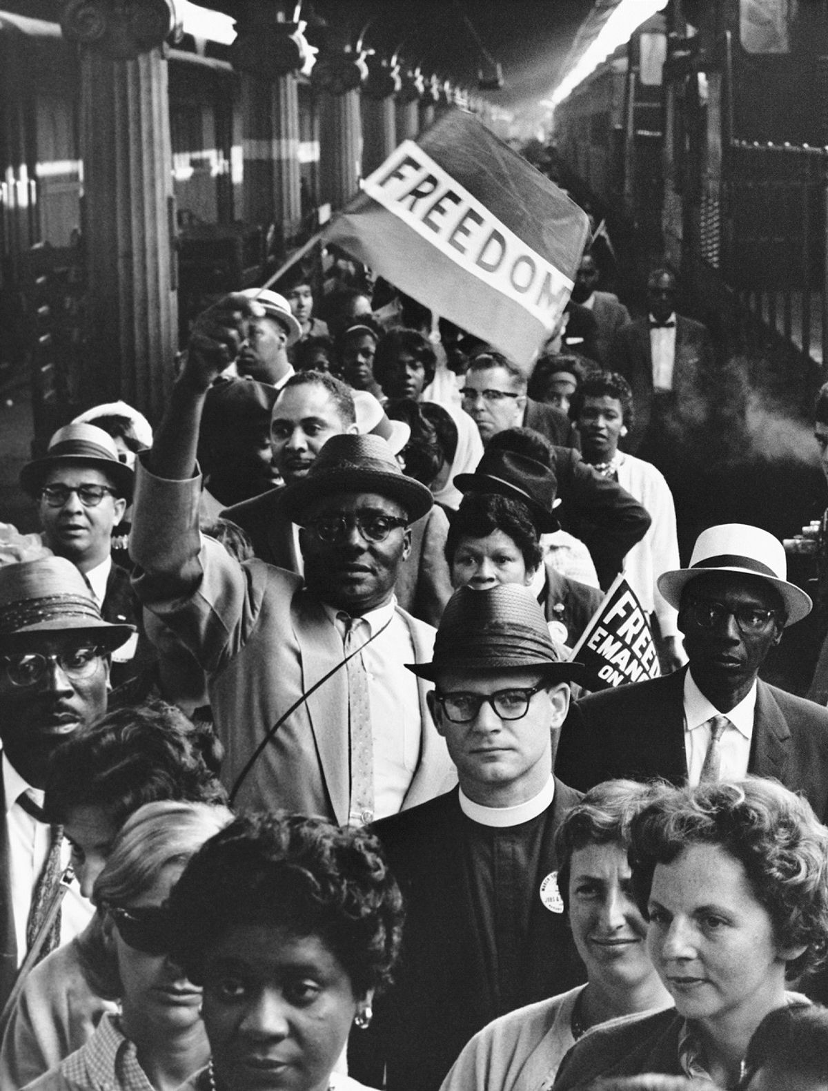 Crowd of adults in 60s casual attire arriving for the March on Washington