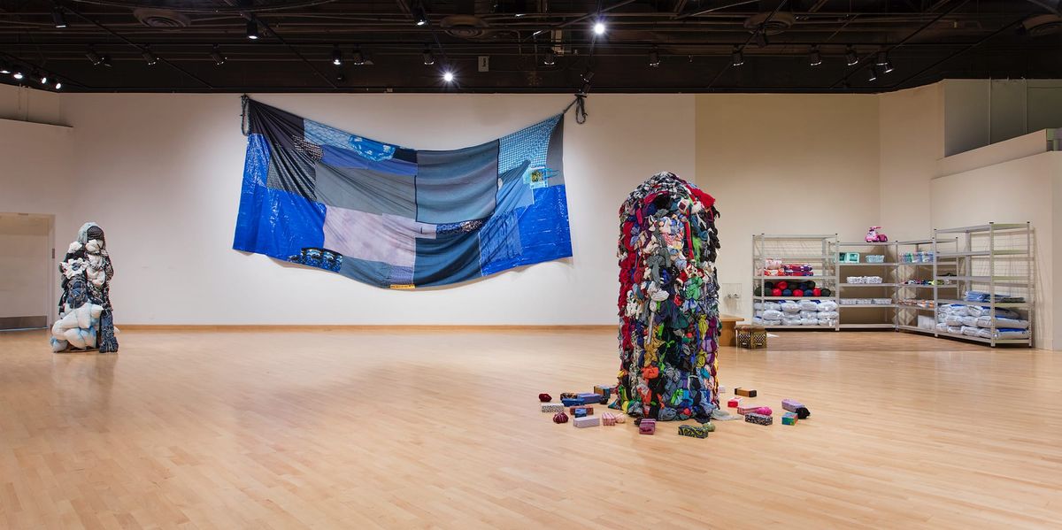 Installation view of sculptures, vignette, and patchwork