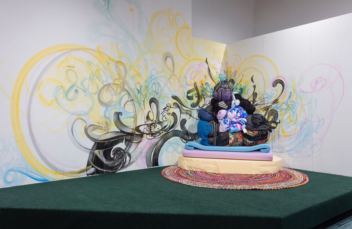 Close up of mural and guru's seat of power in soft refuge space