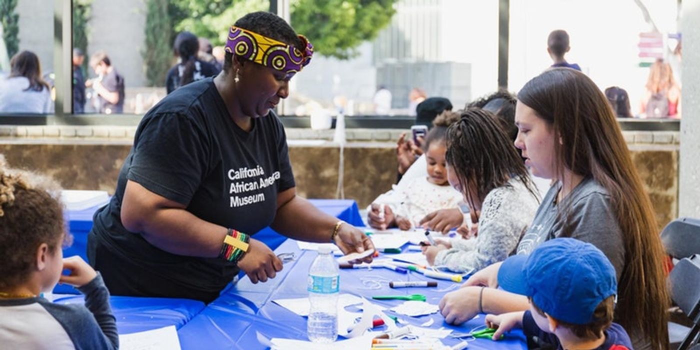 Students making crafts at the California African American Museum