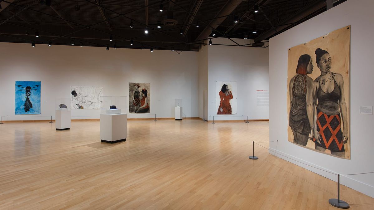 Installation view of large scale painting of two women in conversation