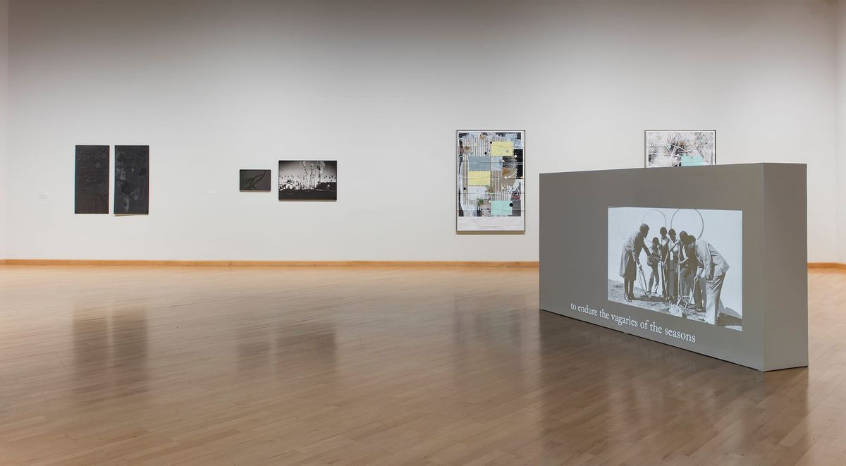 Far view of gallery space and artwork by Guerrier
