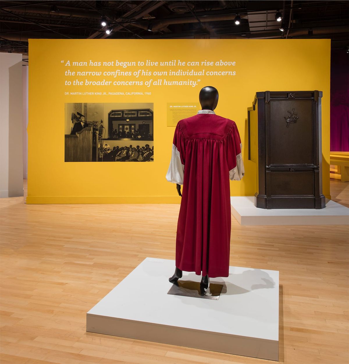 Dark orange choir robe displayed