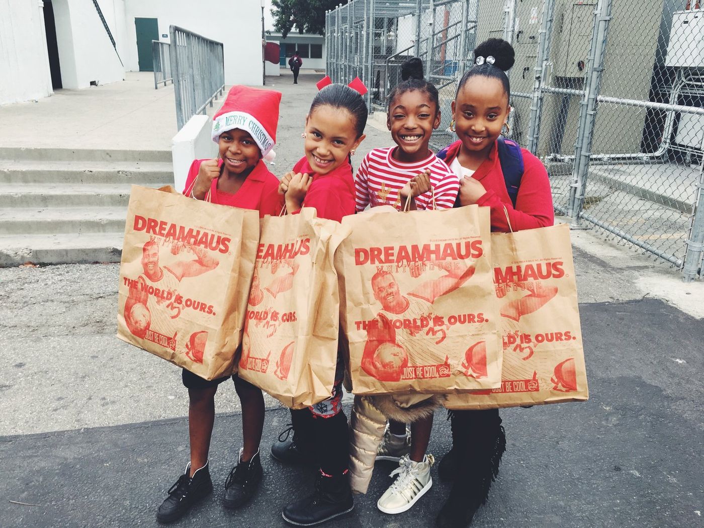 Smiling children with Dreamhaus grab bags