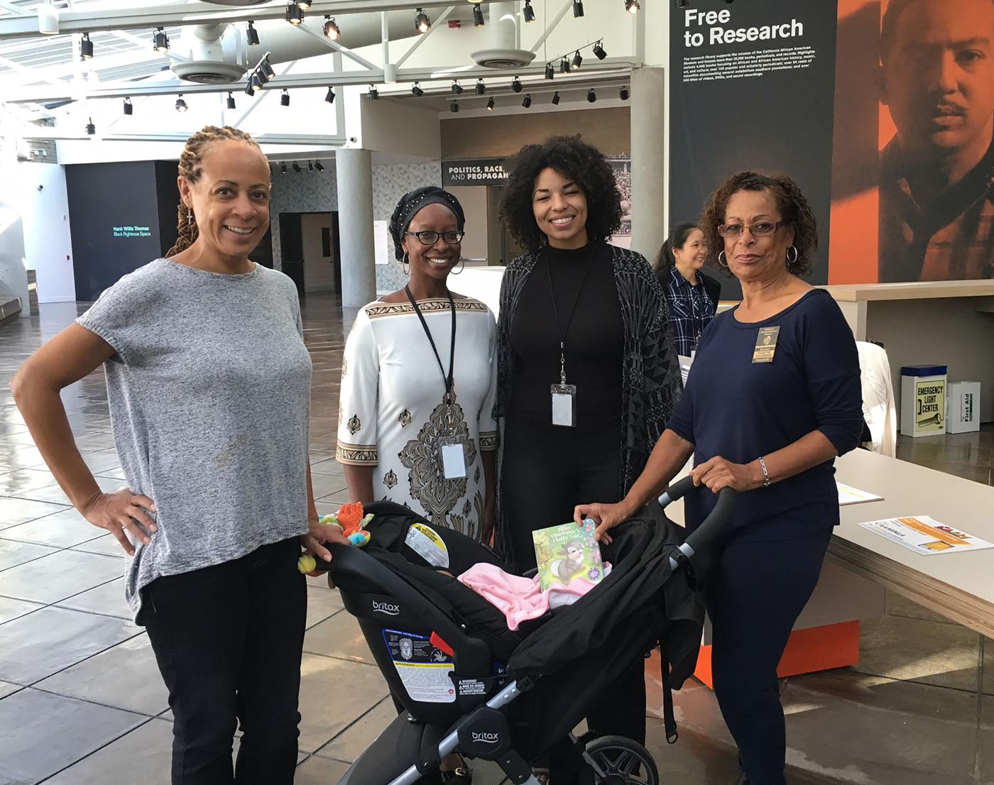 Visitor with California African American Museum, staff