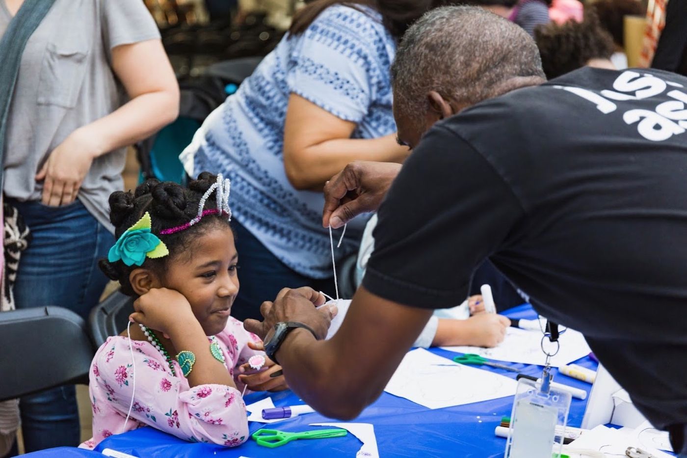 Families participating in an art workshop