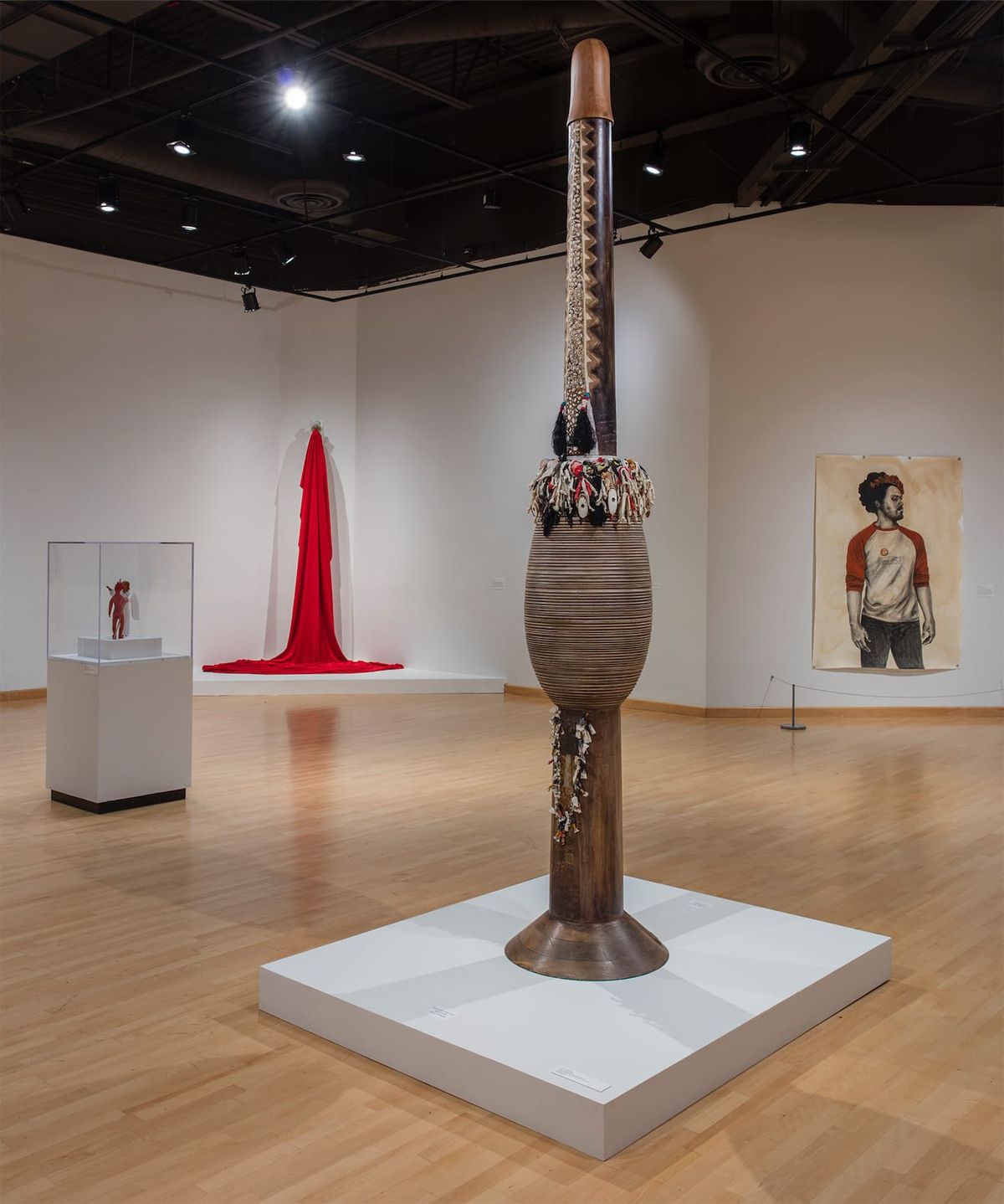 Installation view of sculptures and fabric installation