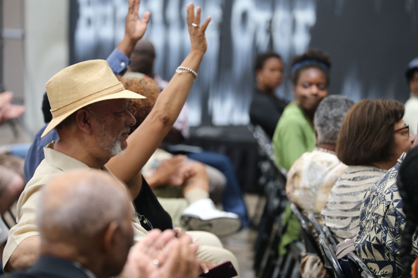 Visitors attending a program at the California African American Museum