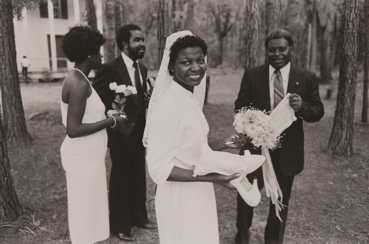 Bride, her father, and two others from wedding party