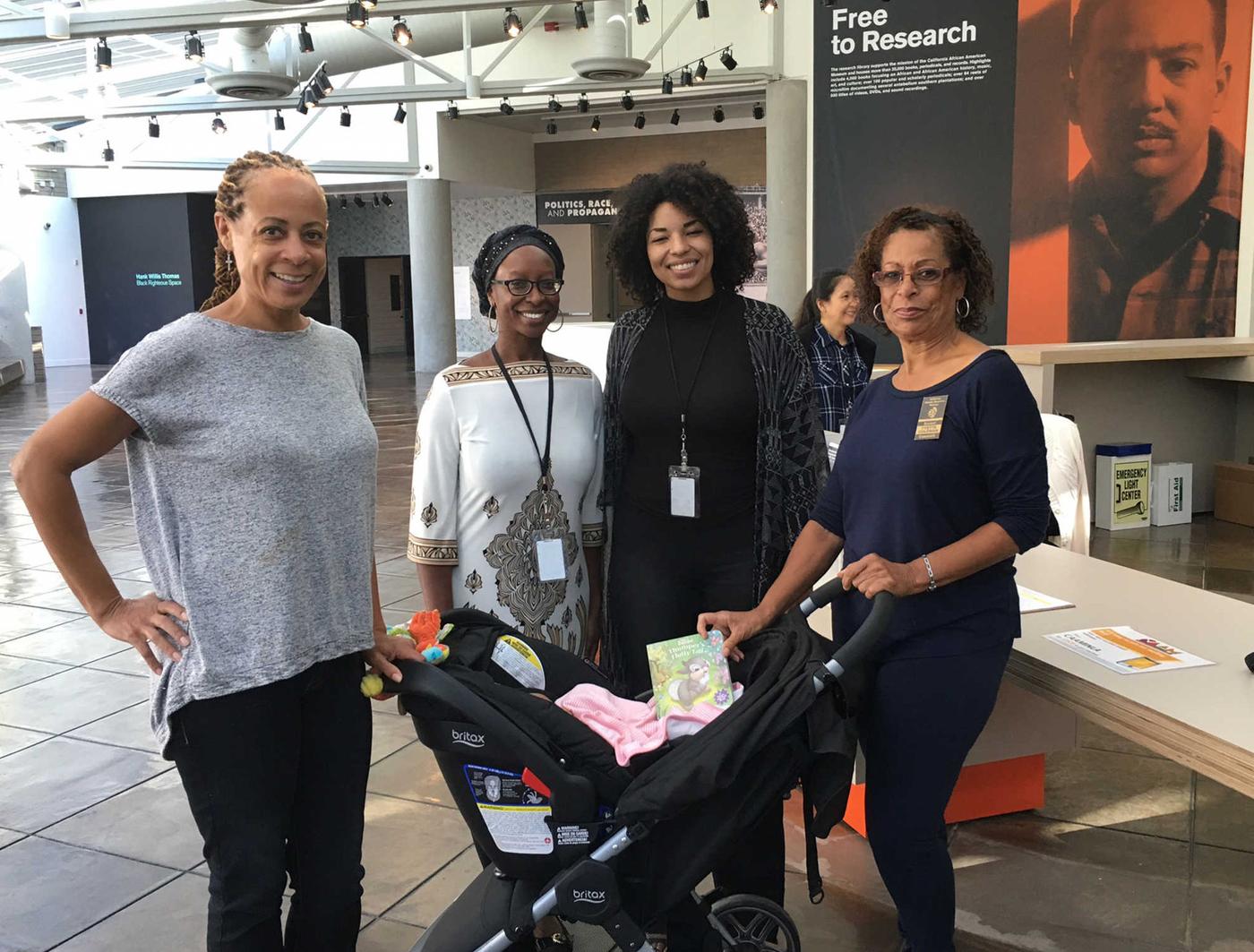 Visitor with California African American Museum, staff