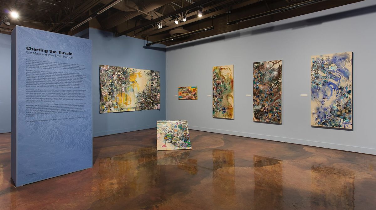 Exhibition view of wall text and 2D works
