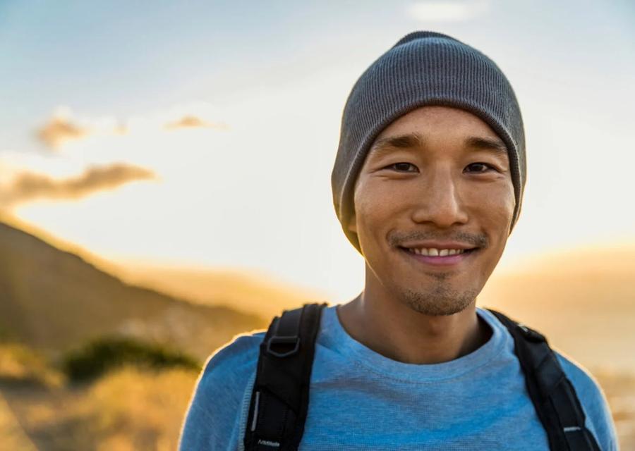 Boldin member hiking at sunset