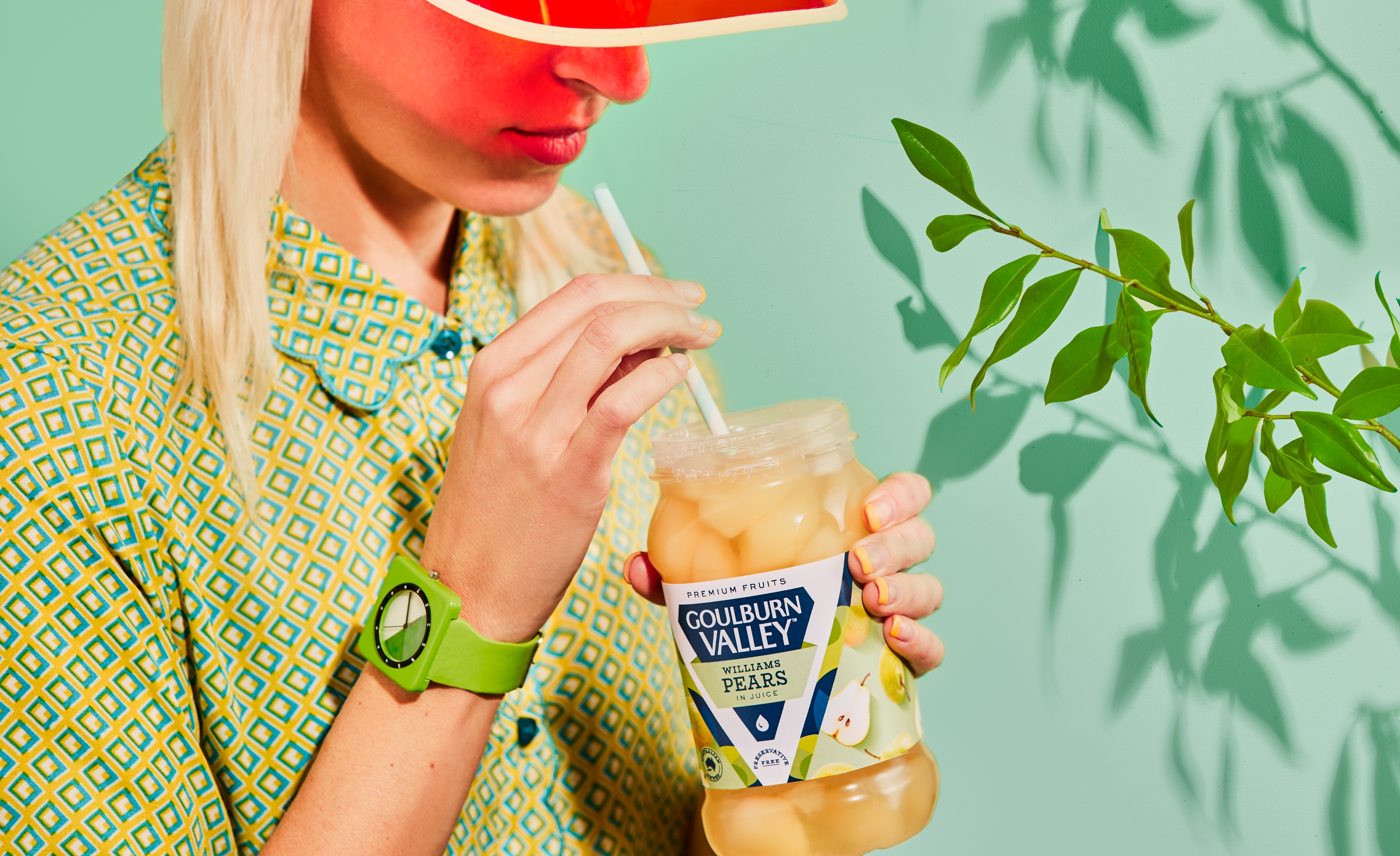 Woman in bright clothing holding a jar of Goulburn Valley, showing the rebrand by packaging design agency Our Revolution