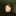 Portrait of Edoardo Lunardi in a black turtleneck against a green background