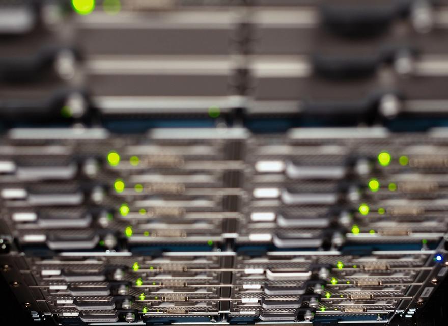 A close view of network equipment in a server rack.