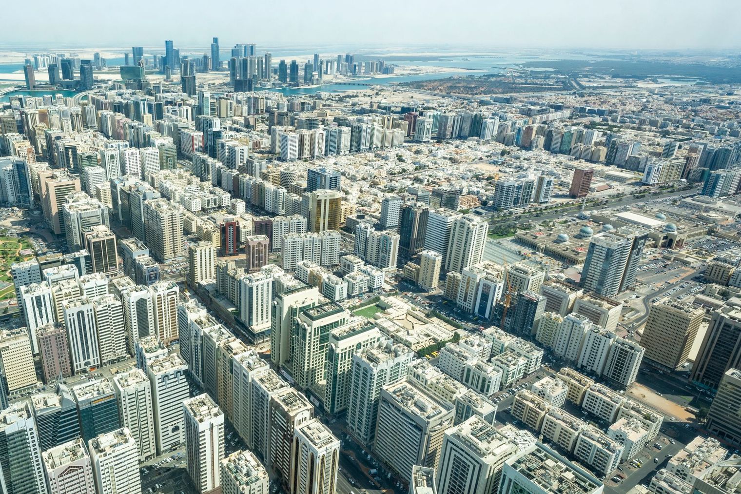 Aerial view of Abu Dhabi's high-rise skyline and city