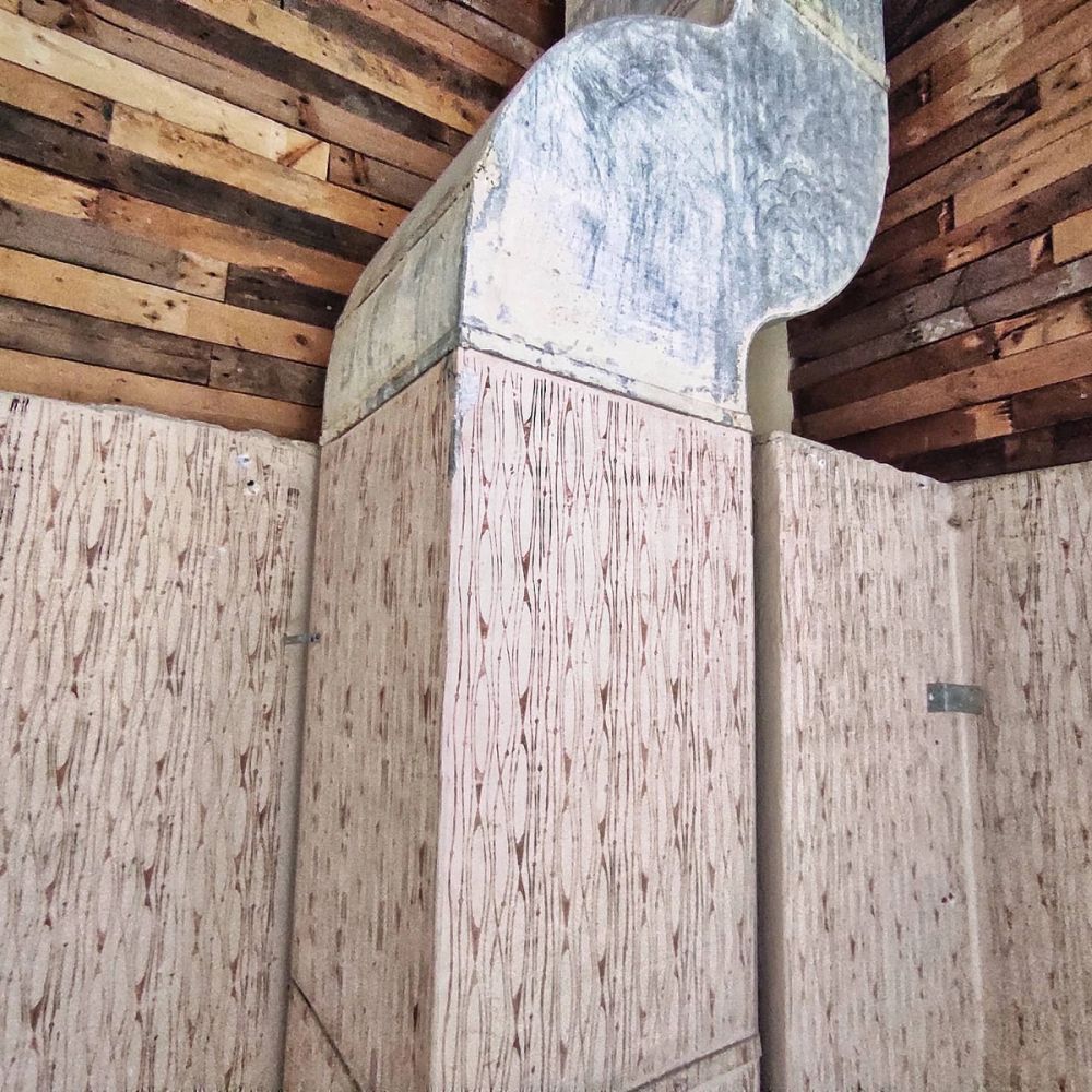 כ