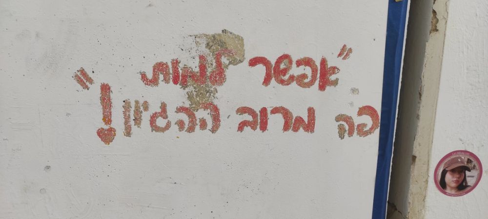 כ