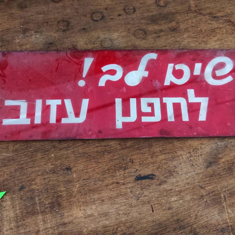 כ