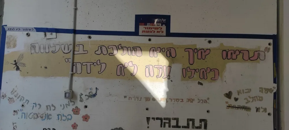 כ