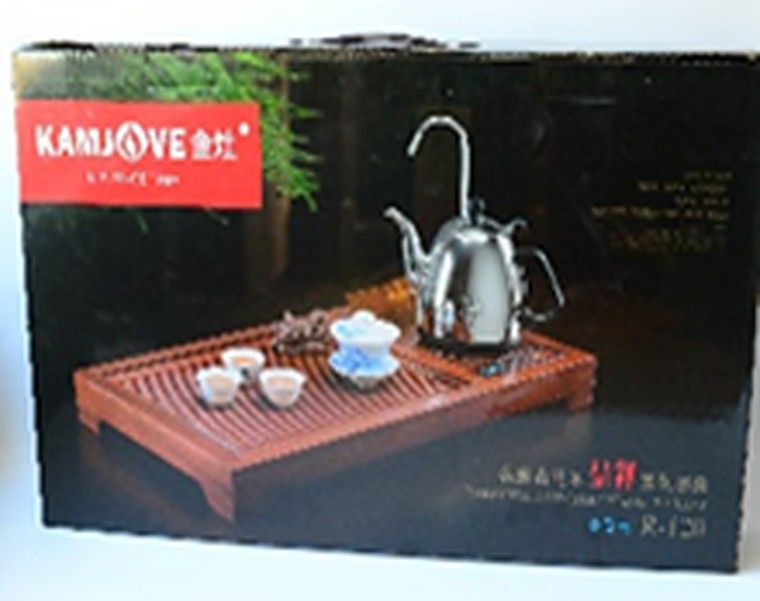 Столик для чайной церемонии "KAMJOVE": Столик размер (общий) 62,5см .Х 33,5см. Х 6см. Электрический сенсорный интелектуальный подогреватель "KAMJOVE". Металлмческий чайник 900мл. Автоматический набор воды из емкости. - Поддержка заданной температуры с отображением температуры на дисплее. Шкатулка для хранения чайных пиал. Шланг для отвода сливаемой жидкости.