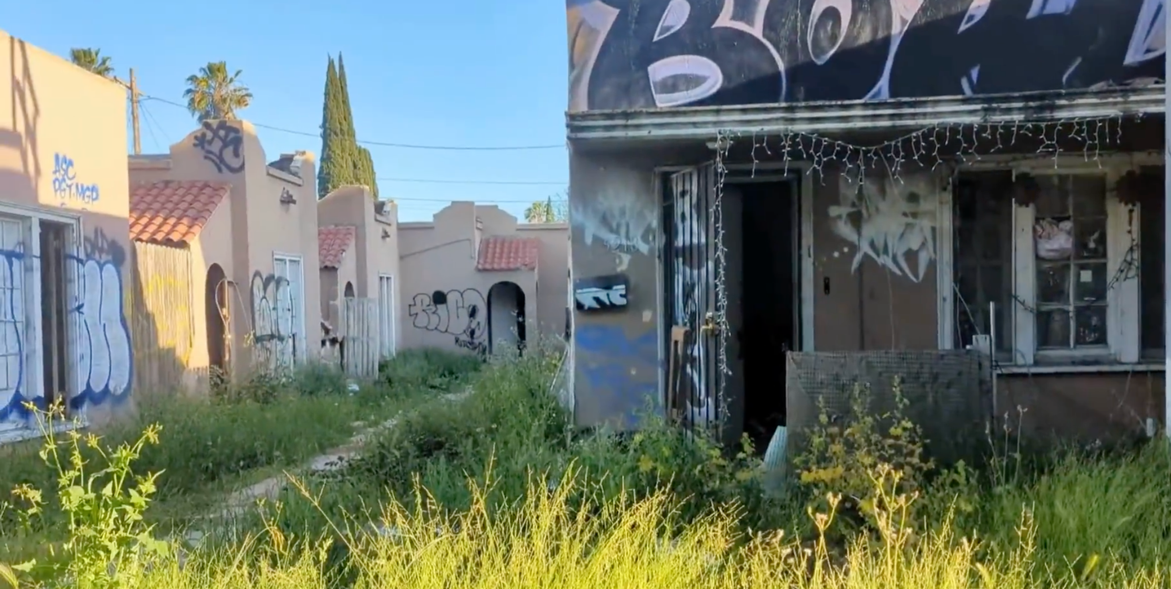 Screenshot of seven empty, heavily vandalized, and blighted RSO bungalow court units at 5212 Melrose Avenue.