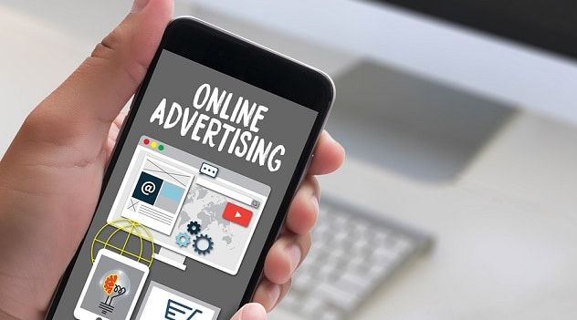 IDFA: What You Need to Know 2 Online Advertising Man Working On Laptop , Online Advertising mobile game