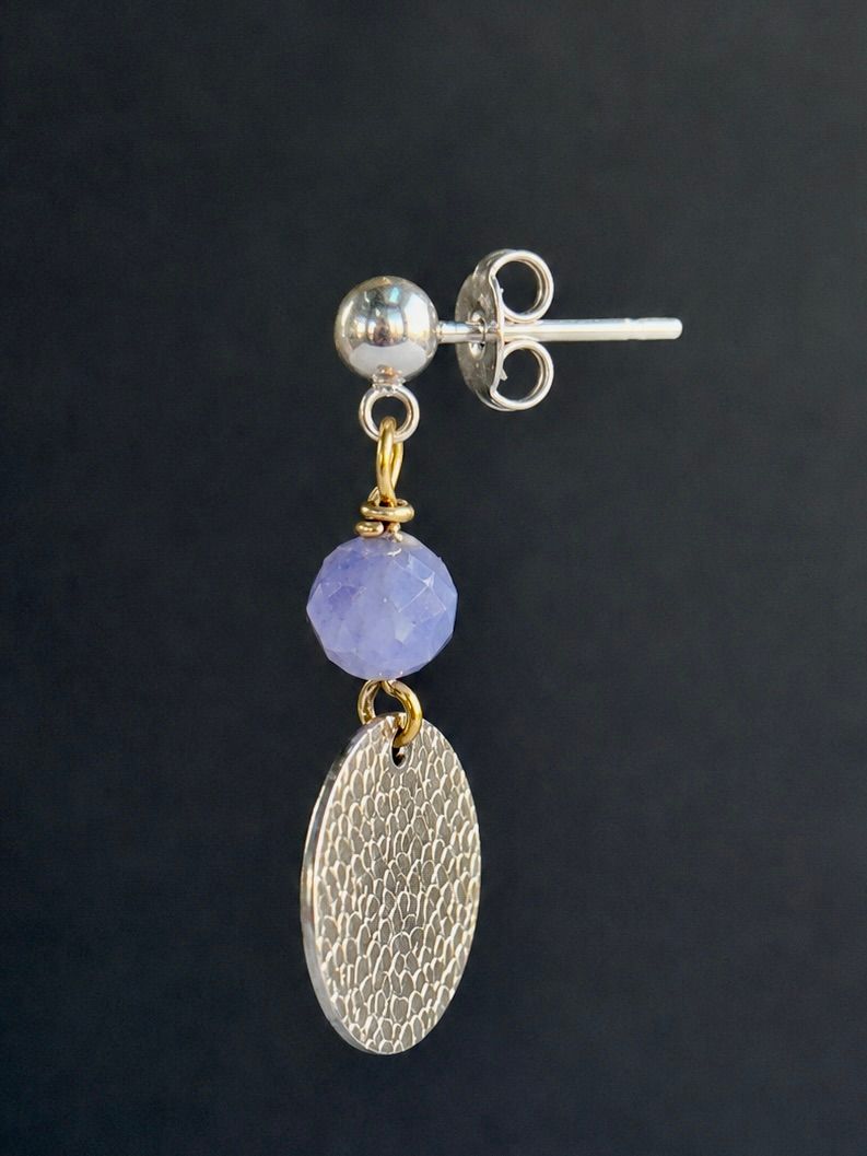 Tanzanite with silver disc