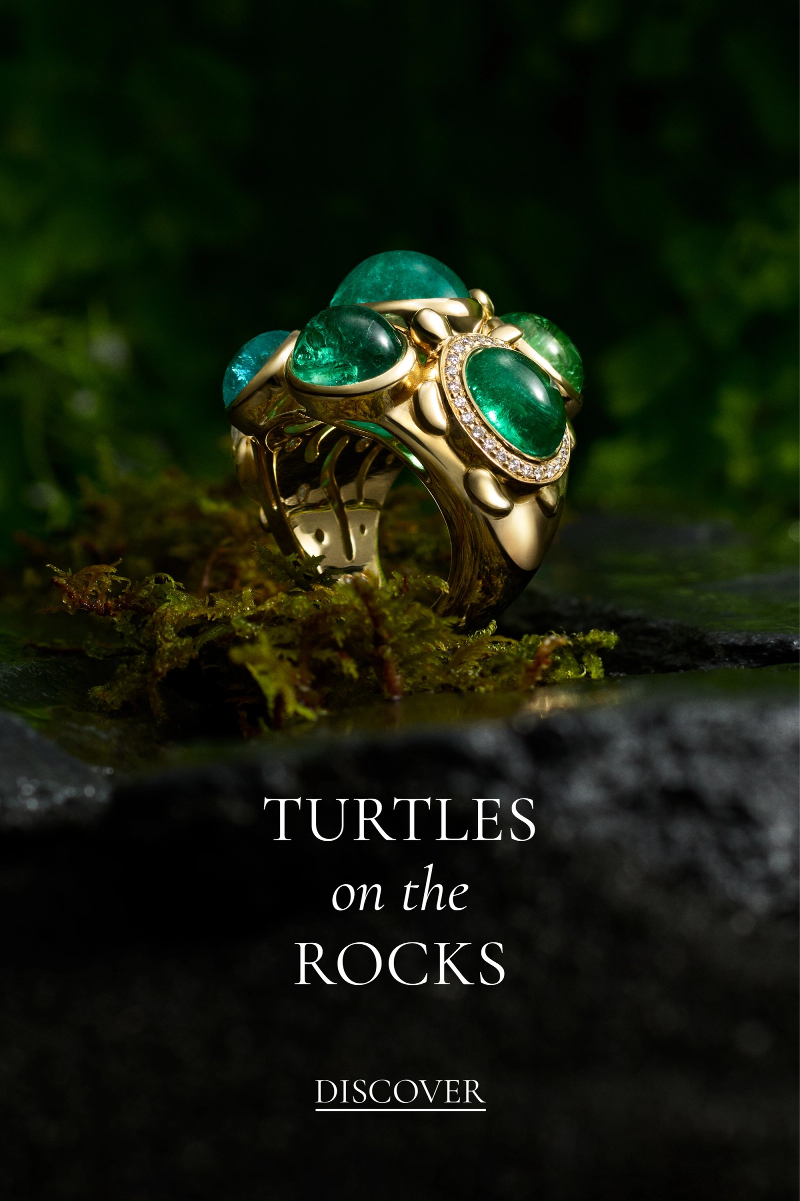 Gold ring with multiple paraiba cabochons and diamond accents, resting on moss.
