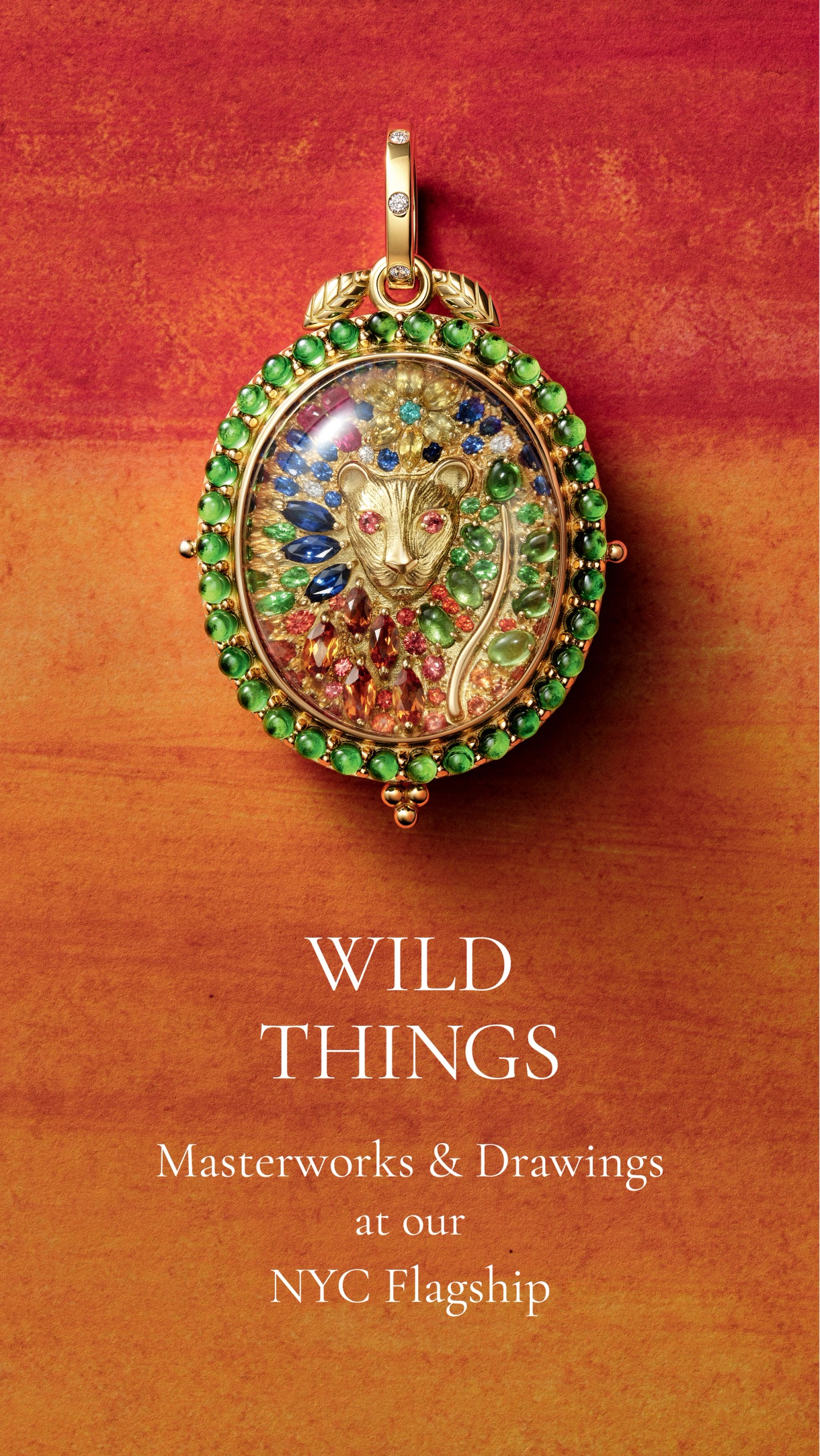 An ornate gold pendant featuring a cheetah's head surrounded by colorful gemstones, set against a red-orange background, with the text "WILD THINGS Masterworks & Drawings at our NYC Flagship".