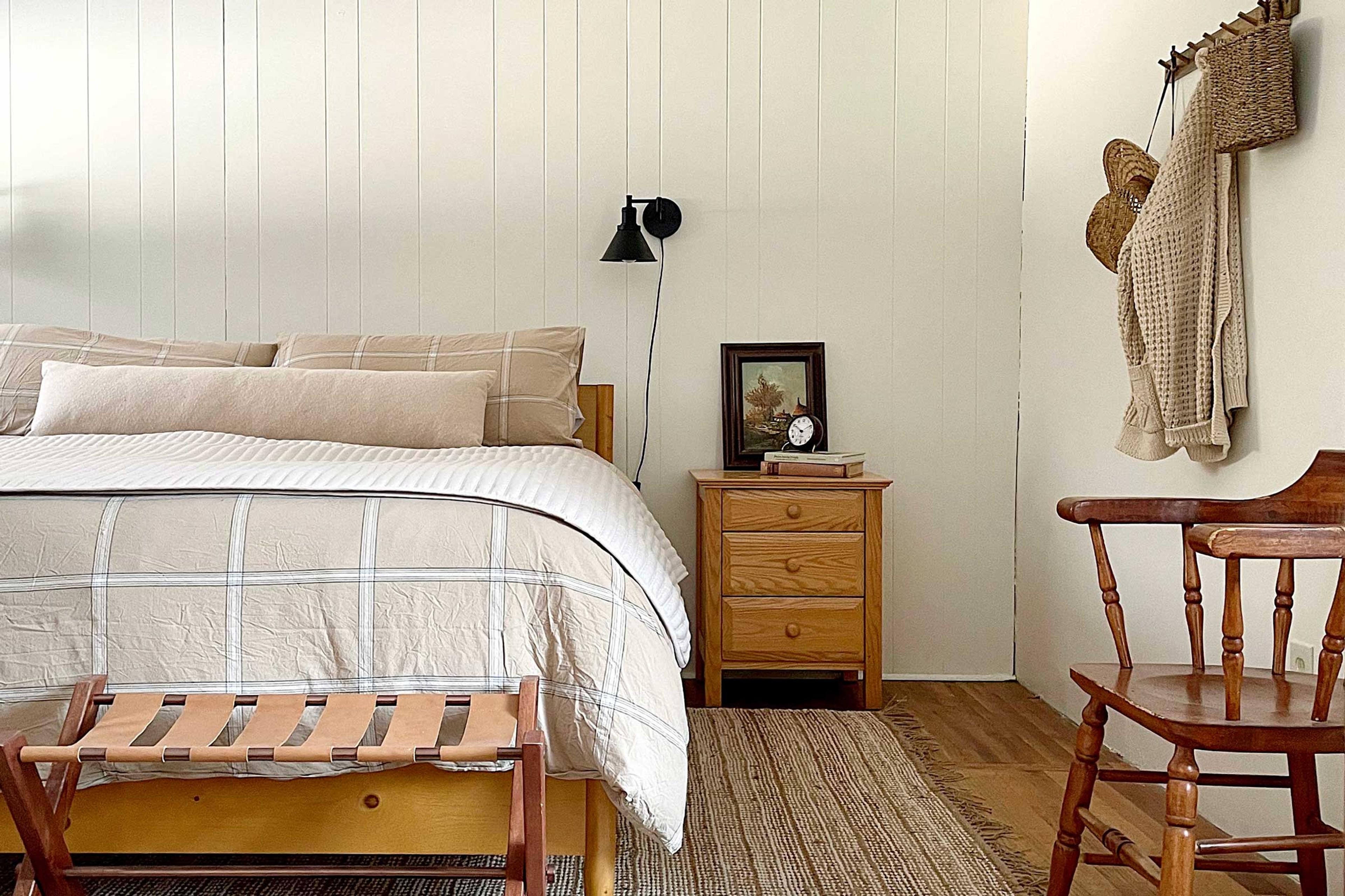 A cozy bed in a cabin.