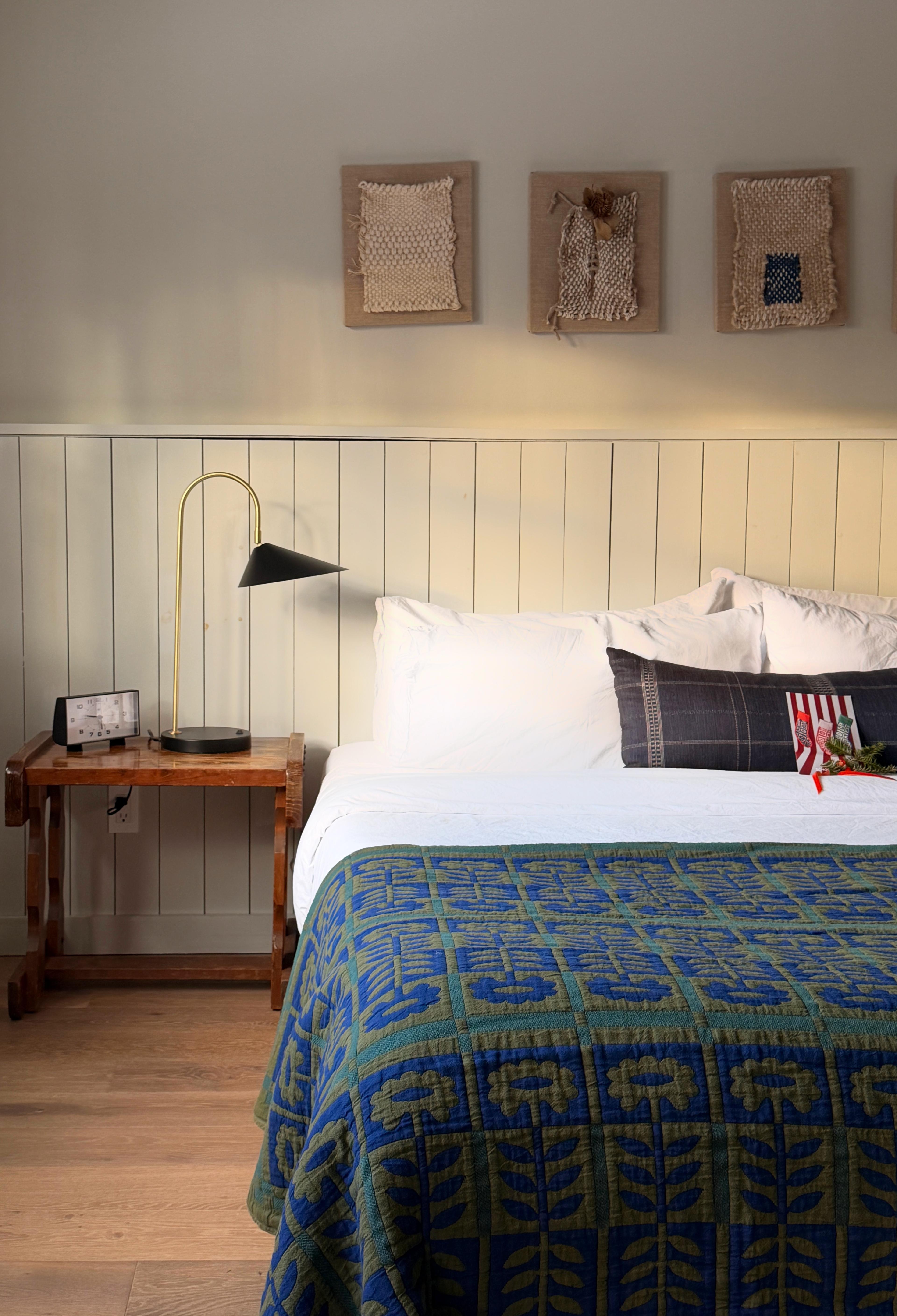 Cozy hotel bed.