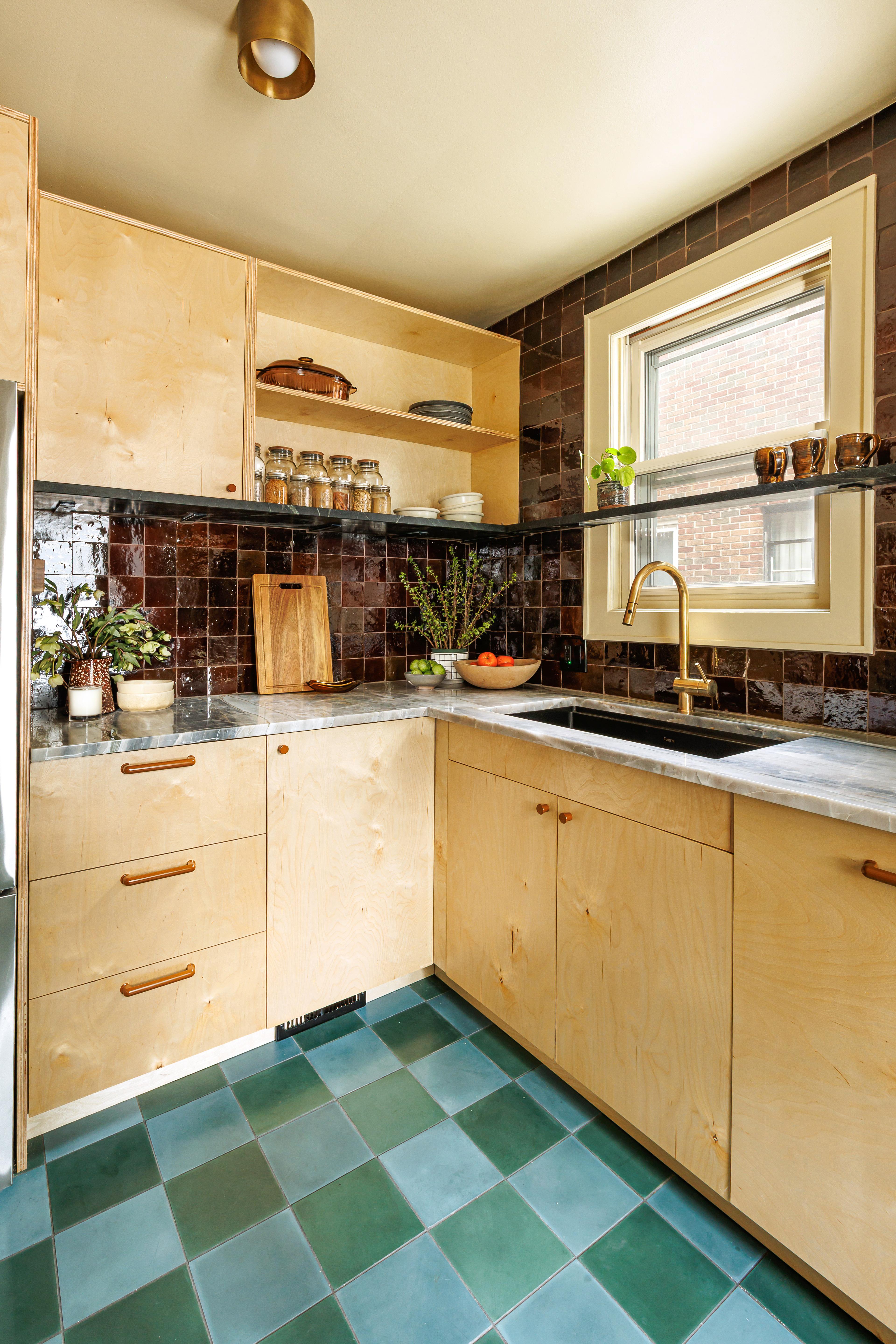 corner of kitchen with oak wooden cabinets 