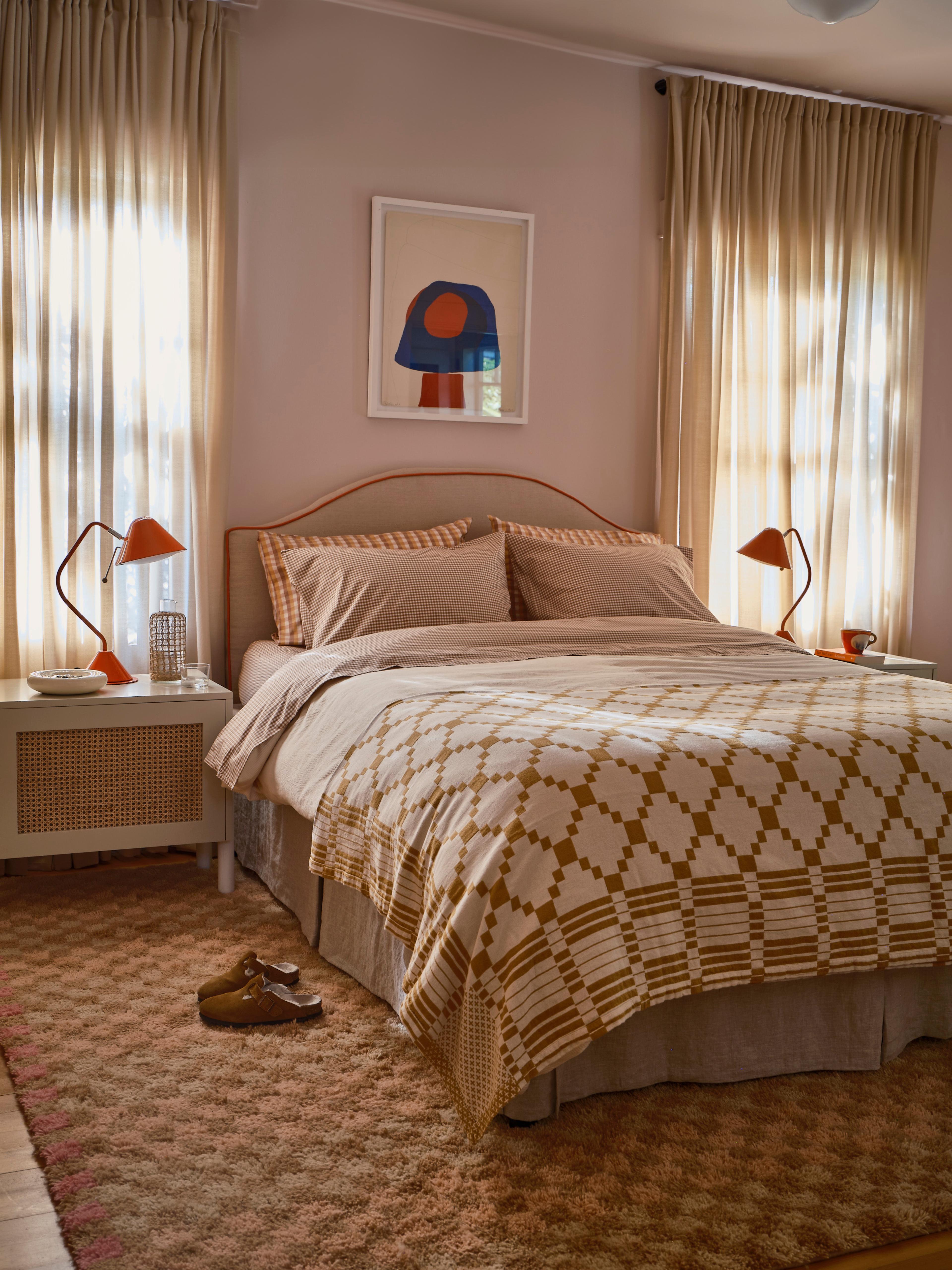Primary bedroom with red accents