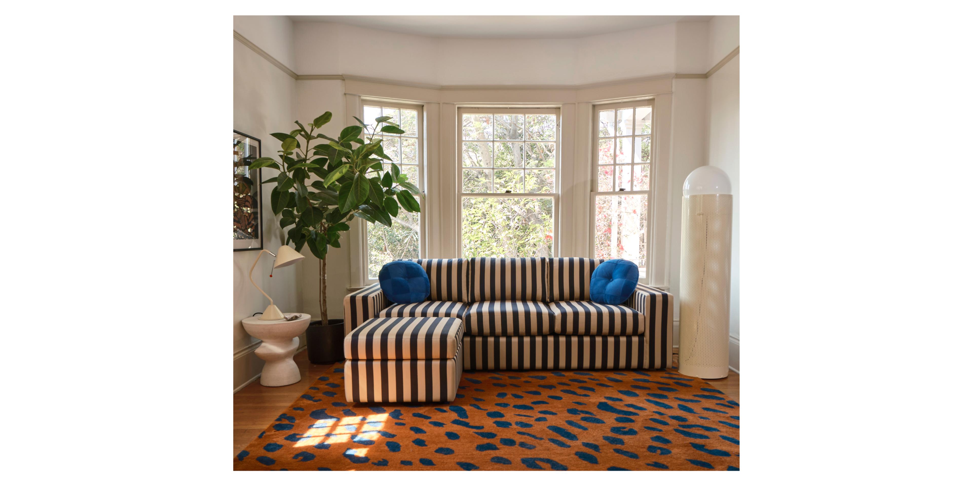 striped couch in living room