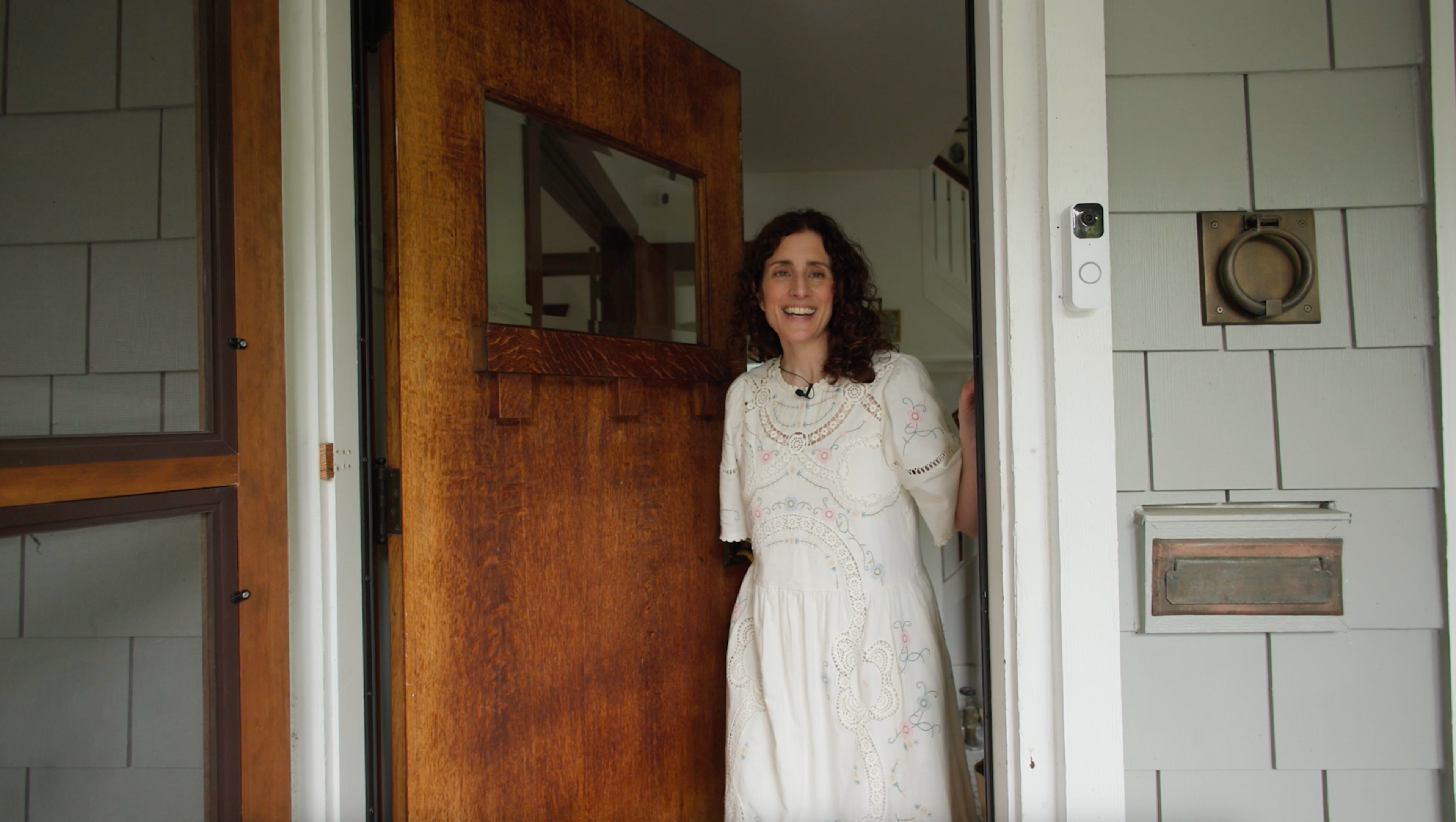 Woman opening the door. 