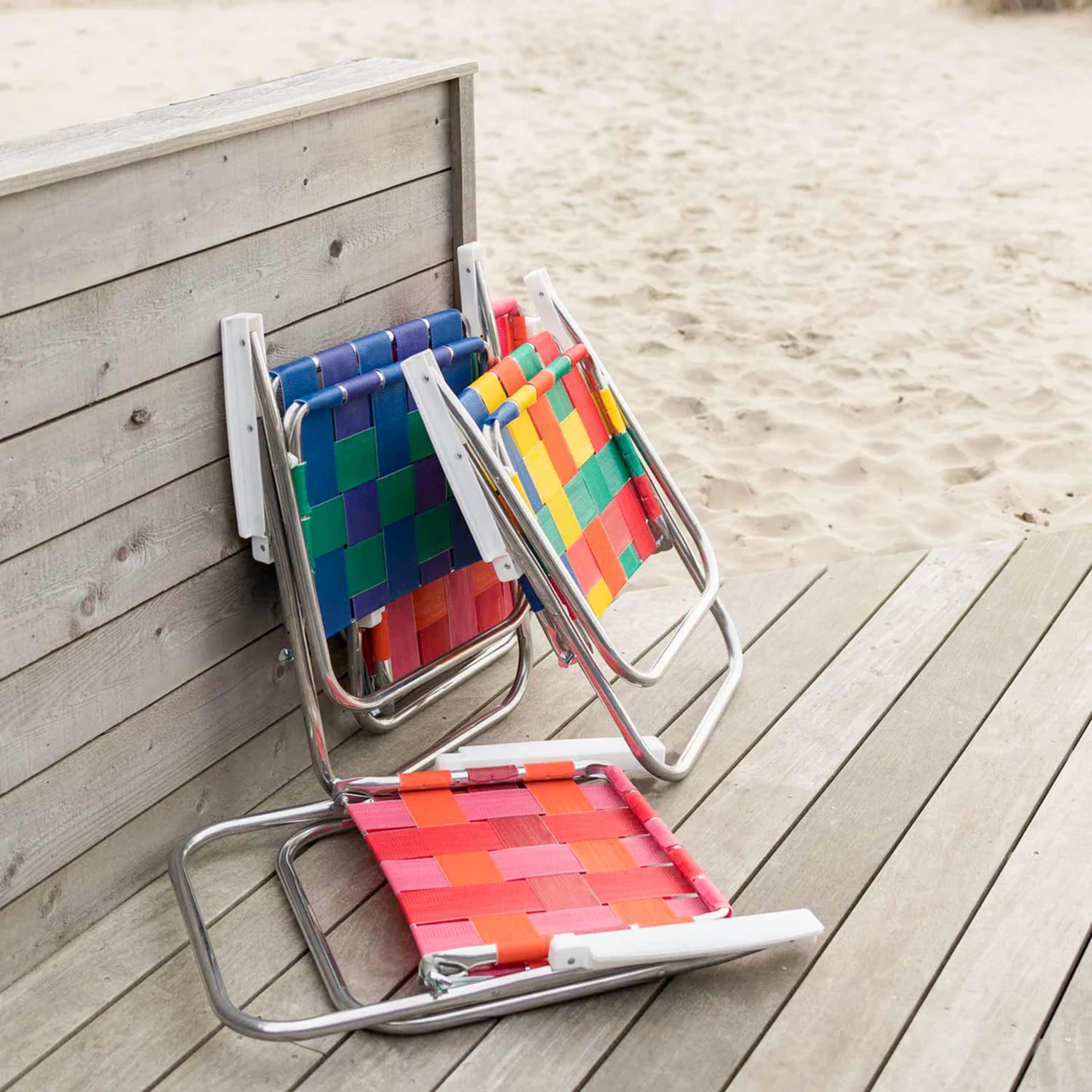 Outdoor chairs on a beach porch. 