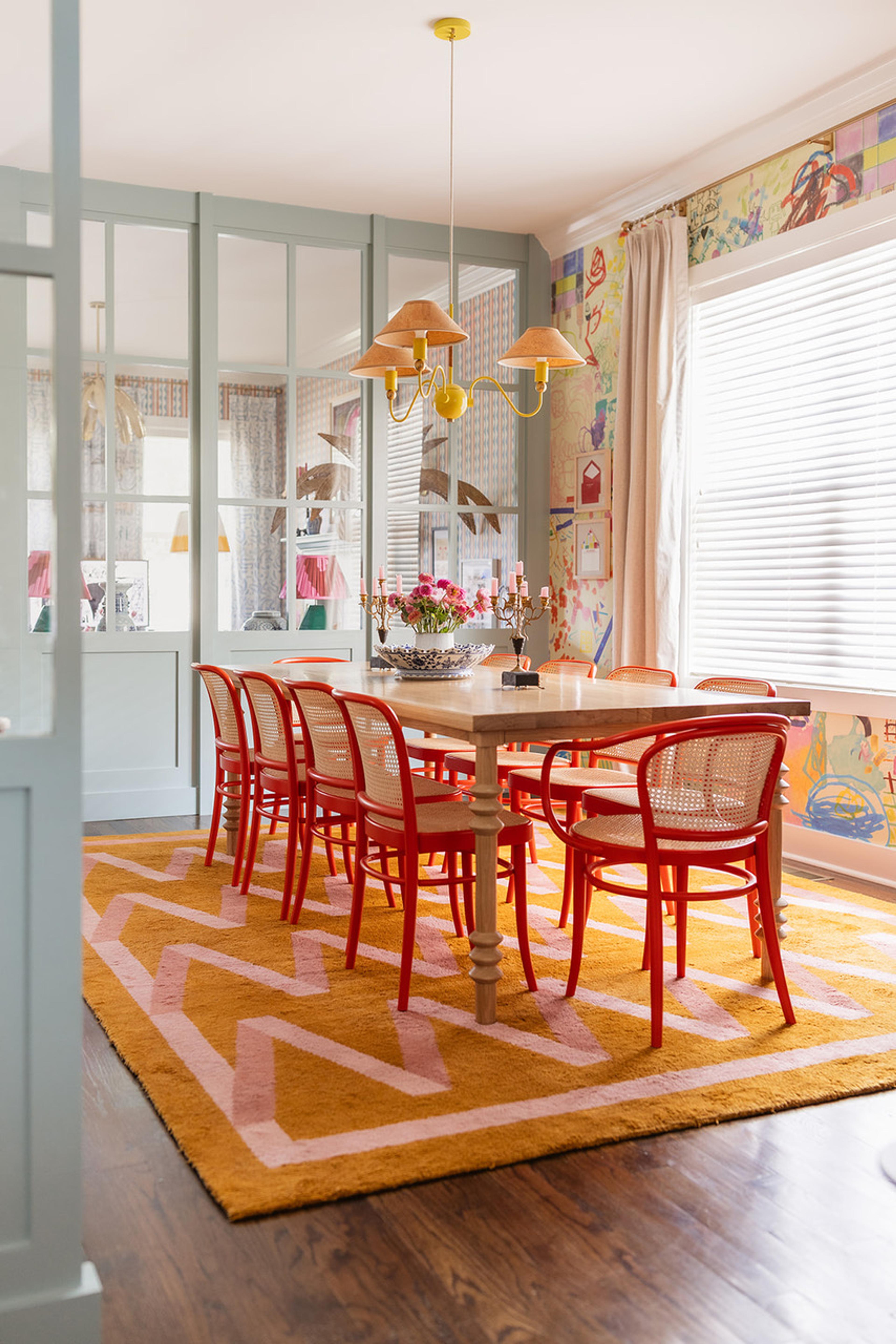 Dining room with red dining chairs
