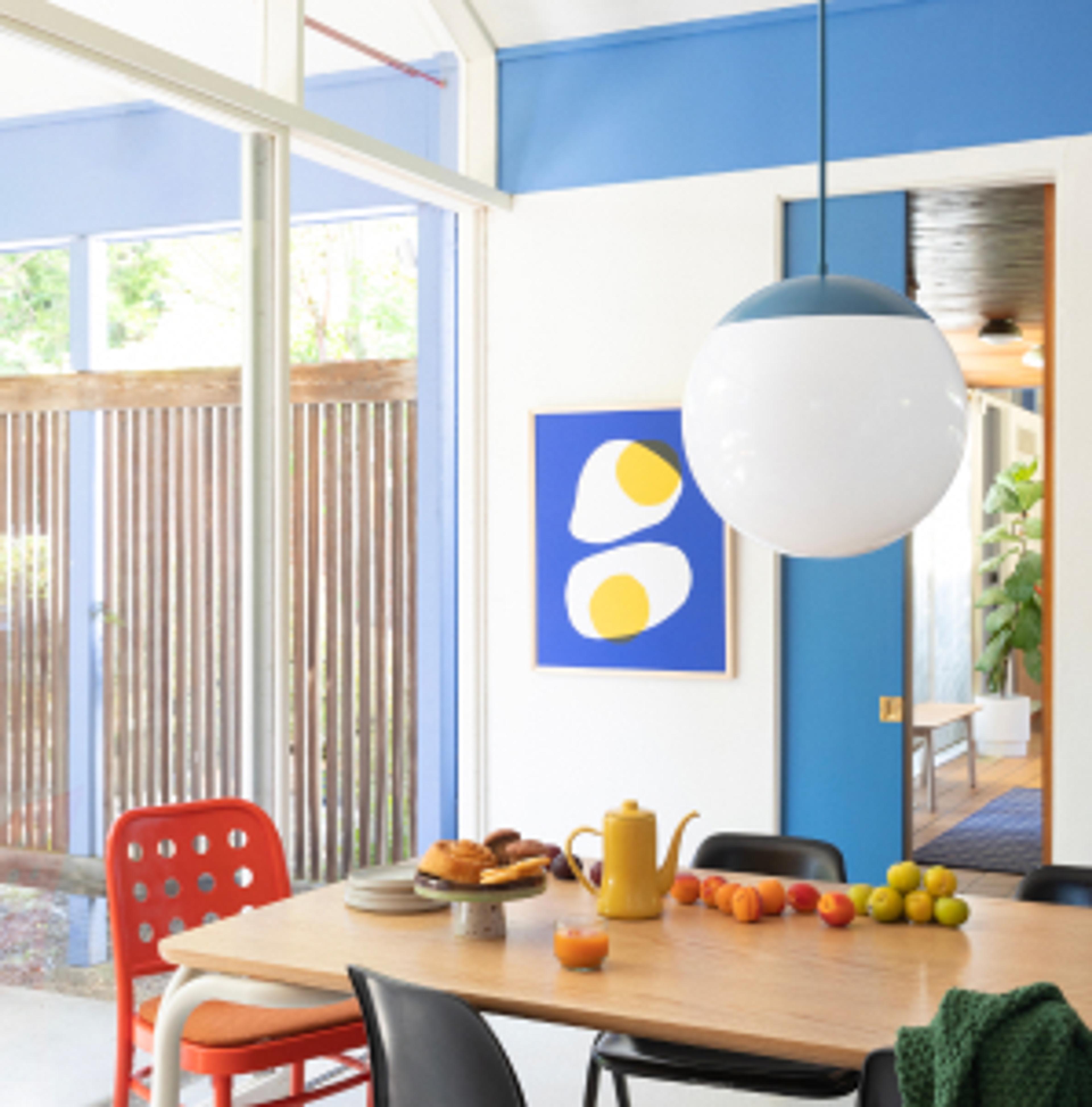 Table set for breakfast in a bright room