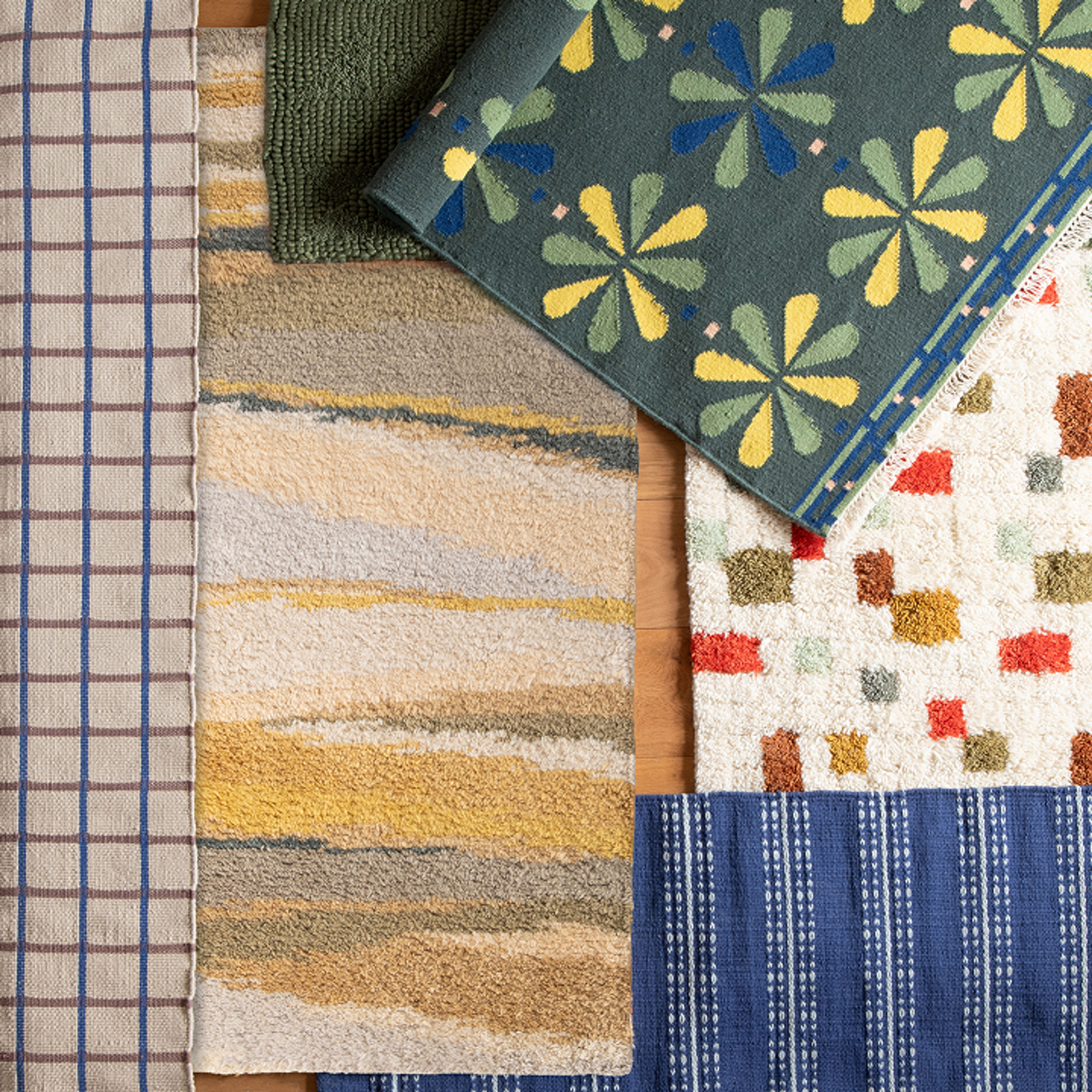 Various rugs in a pile 