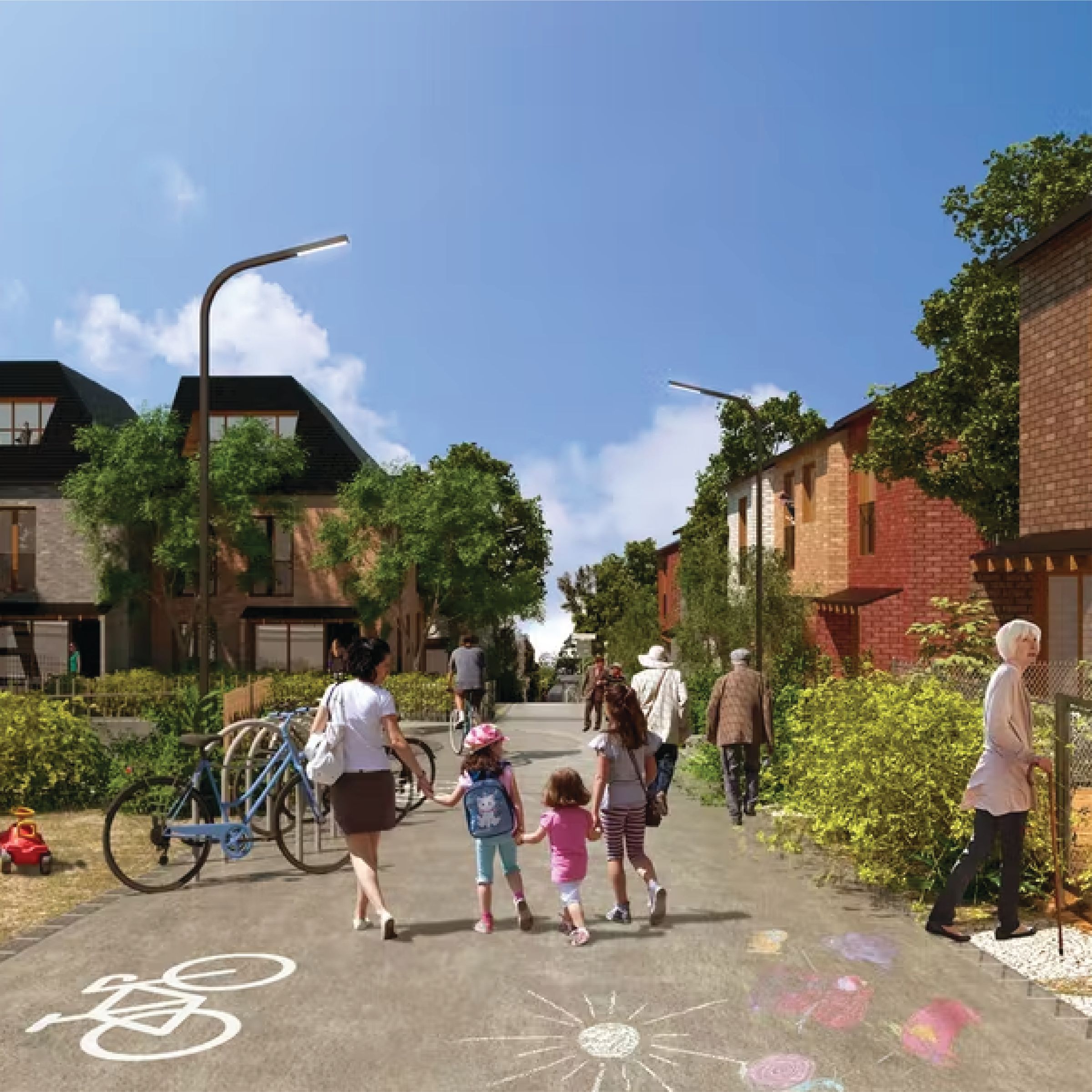A paved pedestrian and bike-friendly street lined with townhouses and trees and greenery with families and elderly people walking
