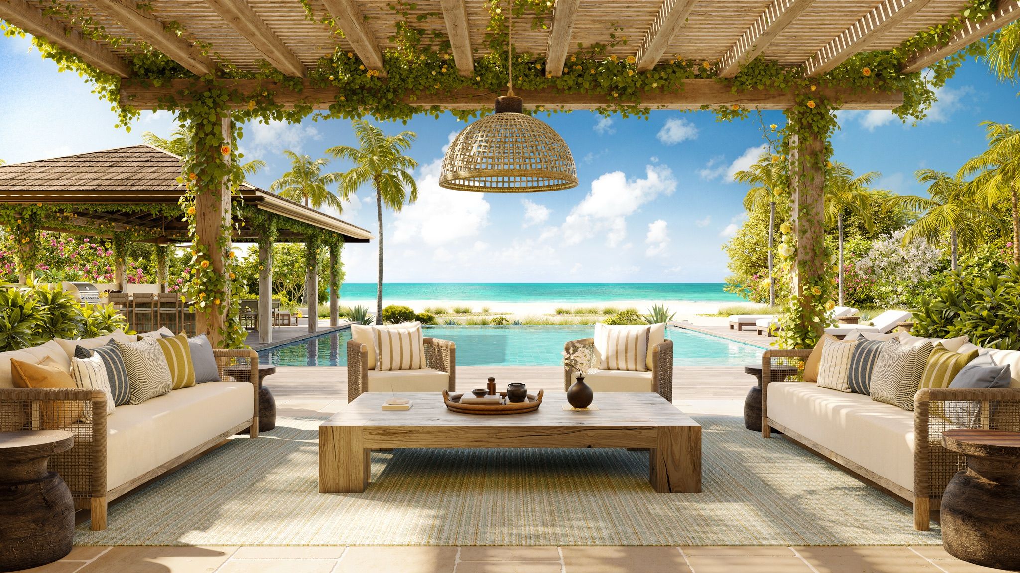 A daybed set within an open pavilion looking to the sea